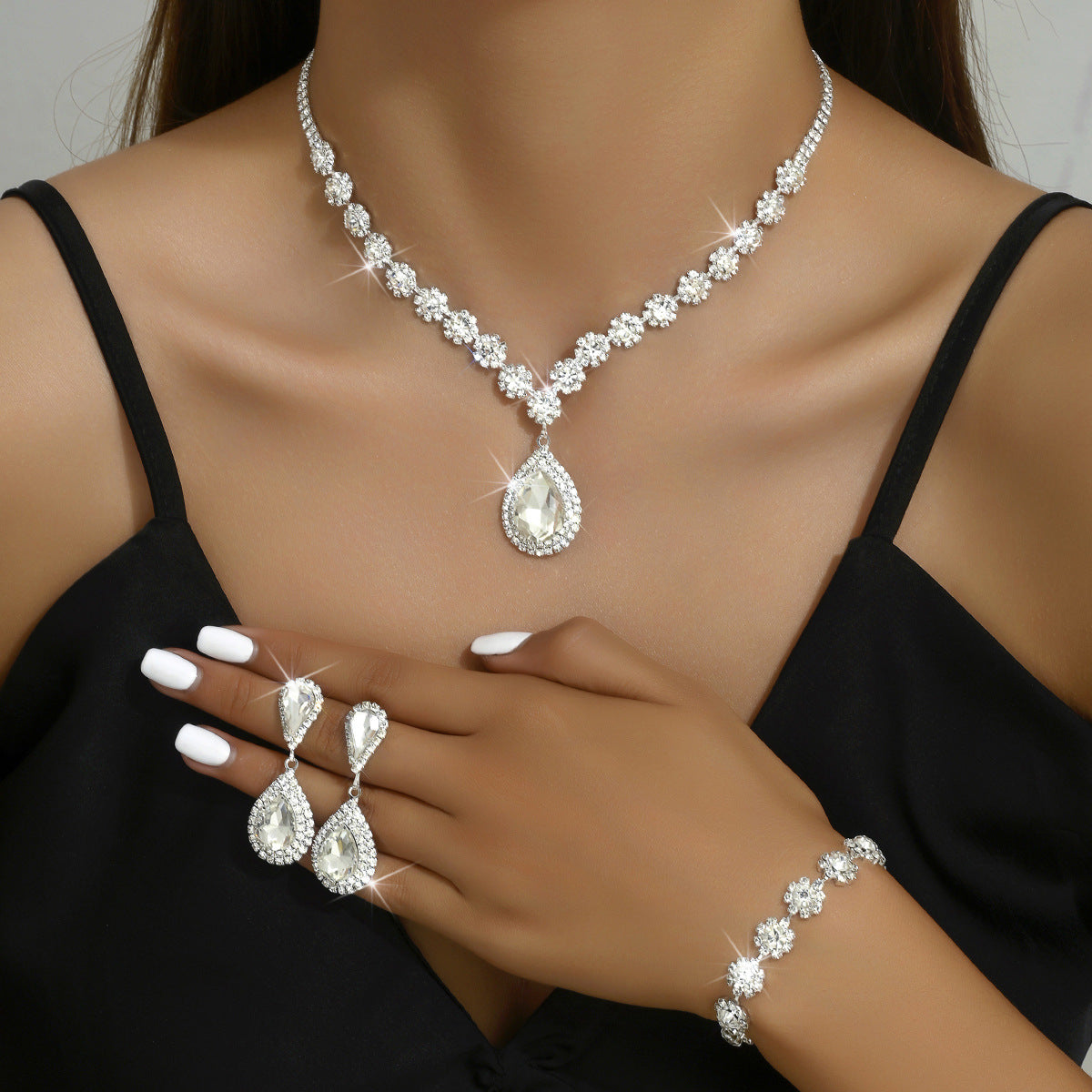 Shimmer Smiths set of three necklace, earrings and bracelet.